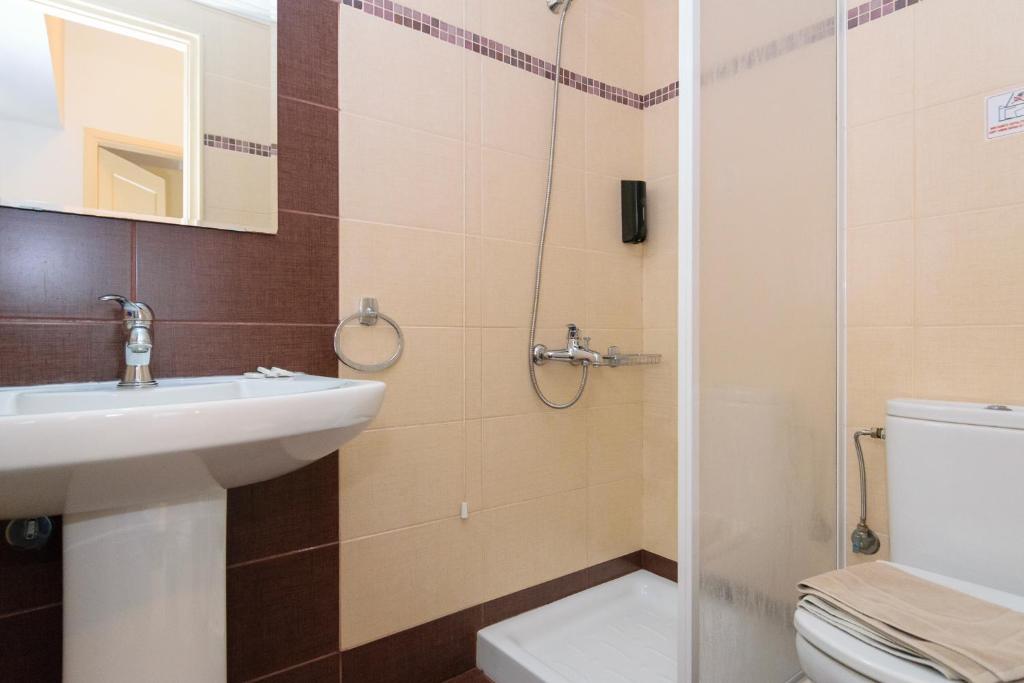 Koupelna v ubytování Archontiki City Hotel