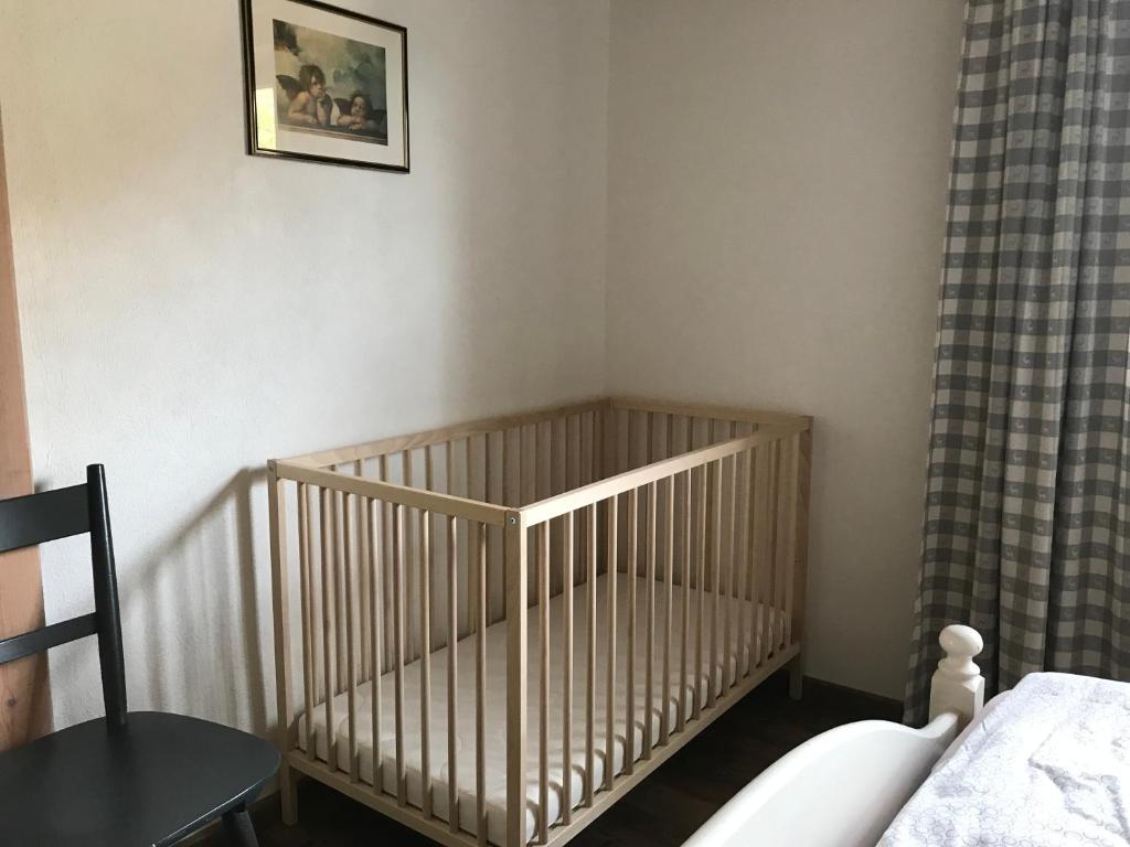 Postel nebo postele na pokoji v ubytování Bei uns im Allgäu - Ferienwohnungen zum Wohlfühlen