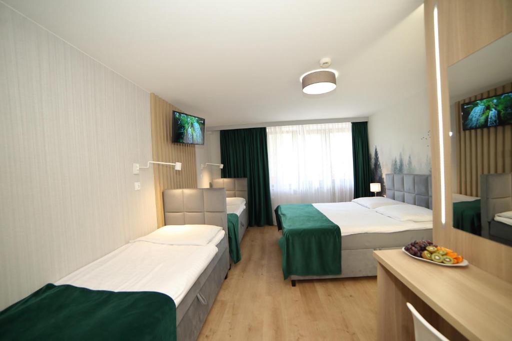 Ośrodek Wypoczynkowy Pod Dębem - Chambre Quadruple De Luxe