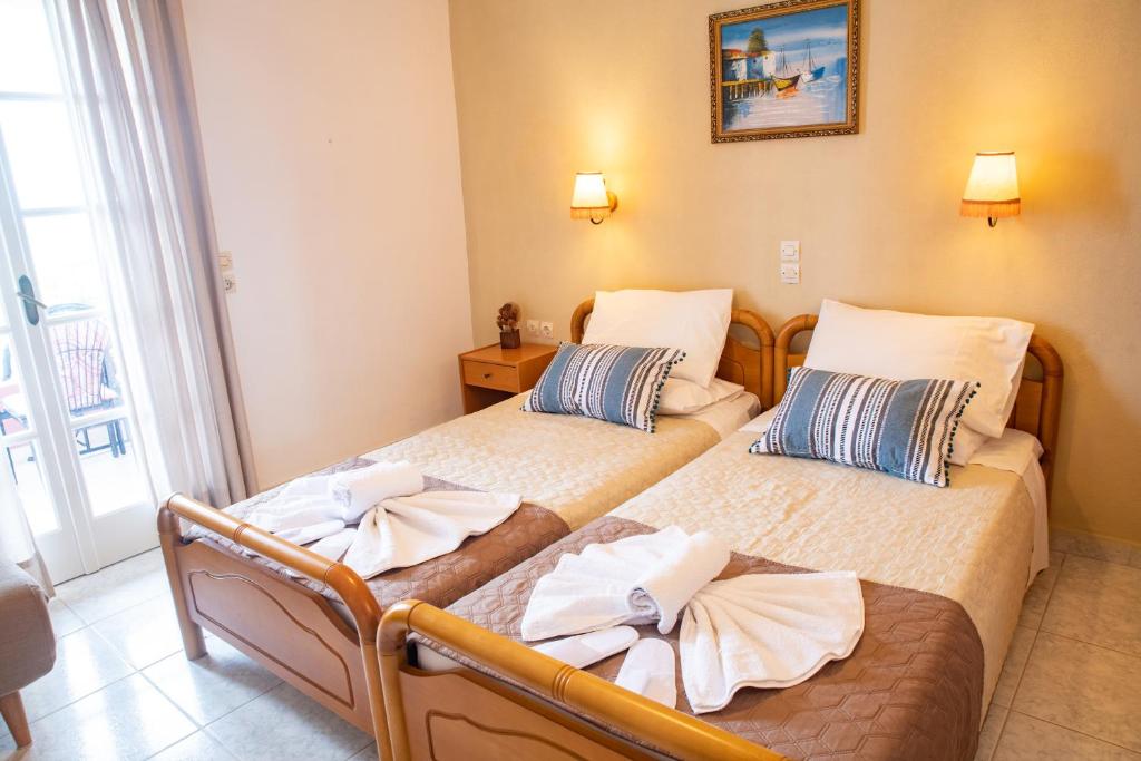 Postel nebo postele na pokoji v ubytování Villa Bambas Resort