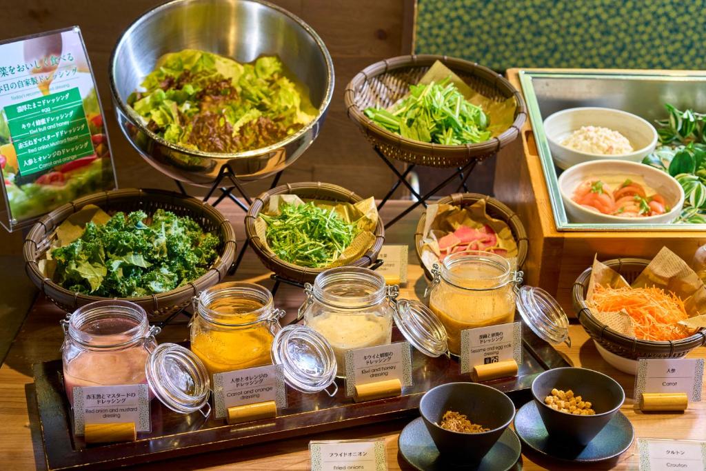 a display of different types of food on a table at Kyoto Tower Hotel in Kyoto