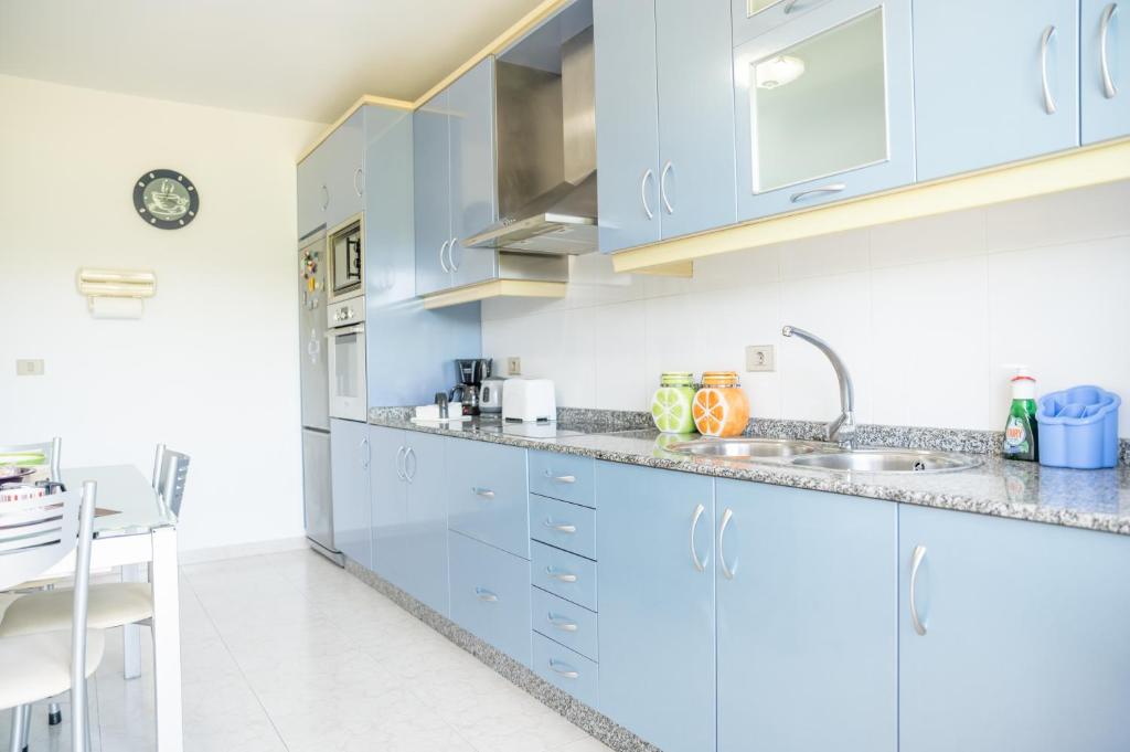 Kuchyň nebo kuchyňský kout v ubytování Apartamento Ultreia