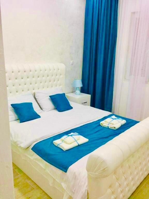 Postel nebo postele na pokoji v ubytování Nikas Guest House