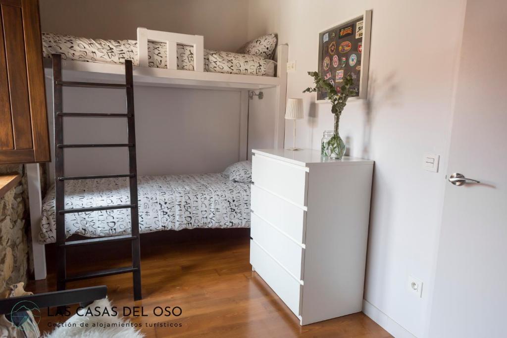 Postel nebo postele na pokoji v ubytování El Torreón - Las Casas del Oso