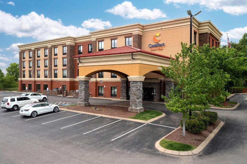 a building with a parking lot in front of it at Comfort Suites Mt. Juliet-Nashville Area in Mount Juliet