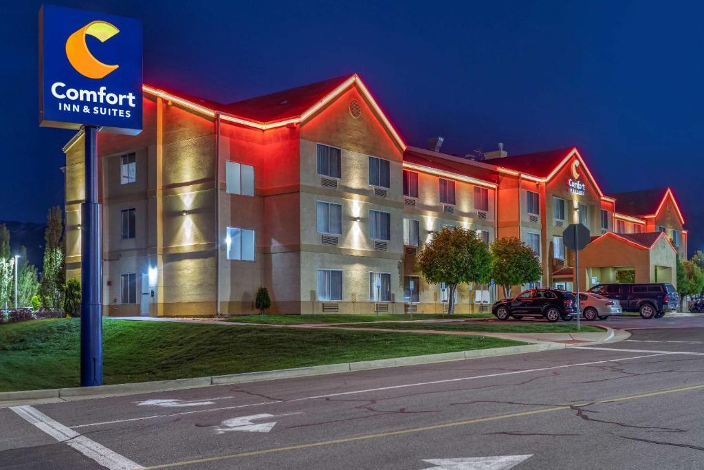 a building with a red light on the side of it at Comfort Inn & Suites Woods Cross - Salt Lake City North in Woods Cross