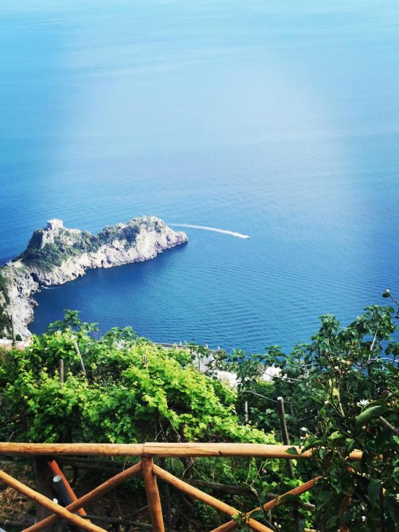 a view of the ocean from the top of a hill at Solecore Amalficoast in Conca dei Marini