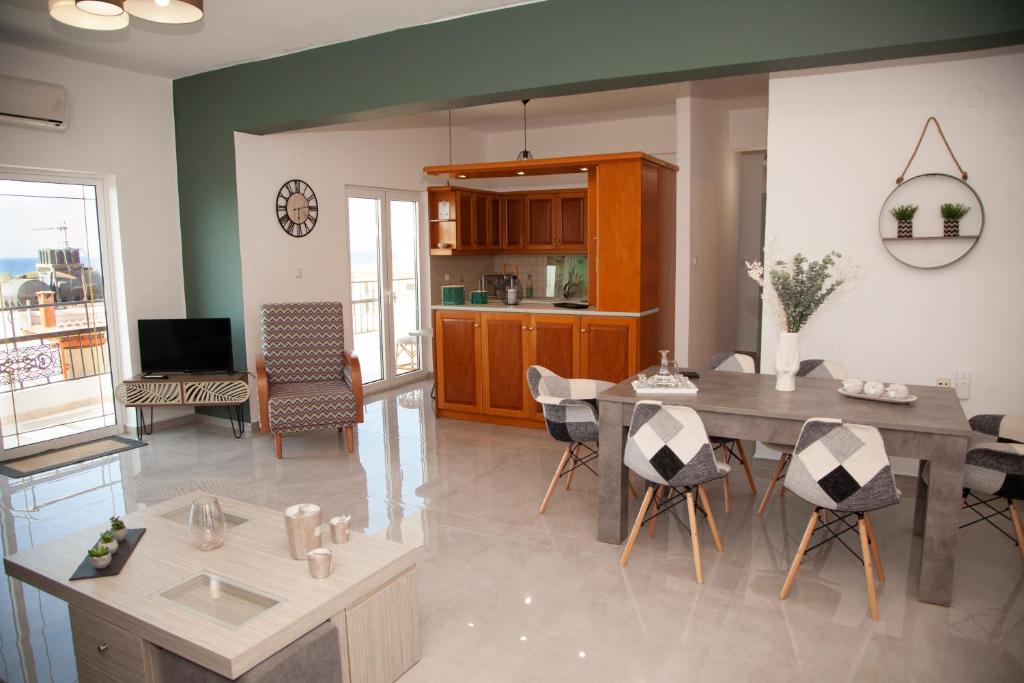 A kitchen or kitchenette at Meraki Beautiful apartment near the sea
