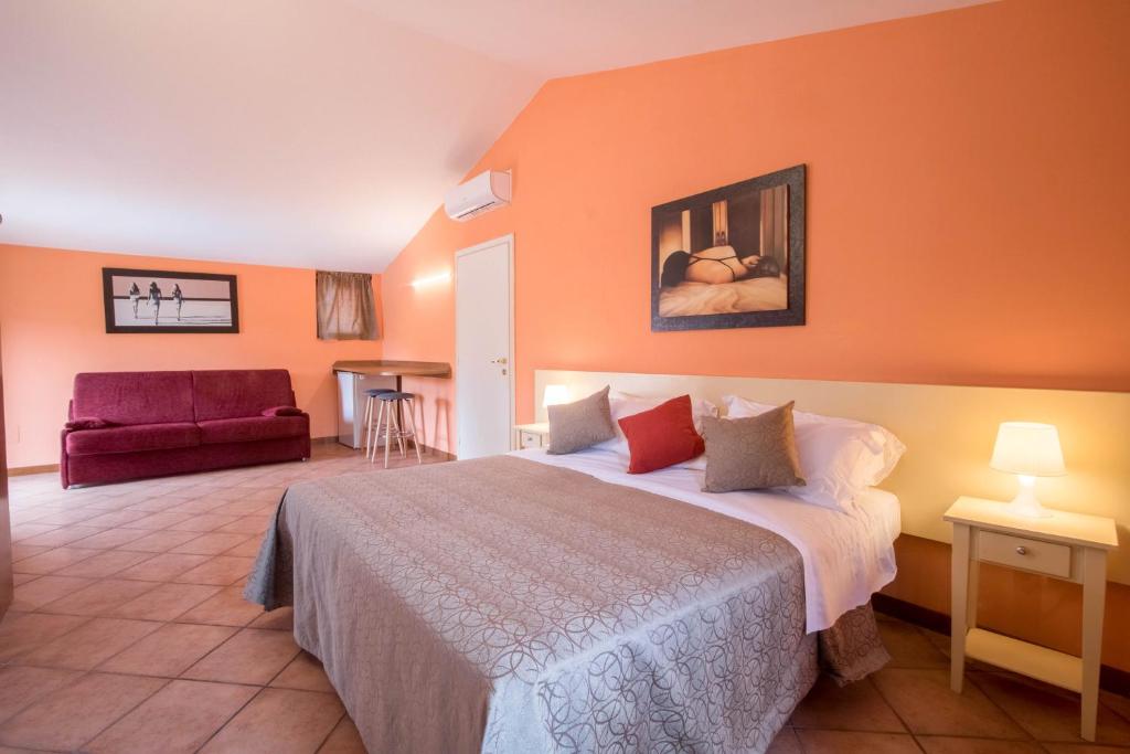 Postel nebo postele na pokoji v ubytování Residence Mugello Resort