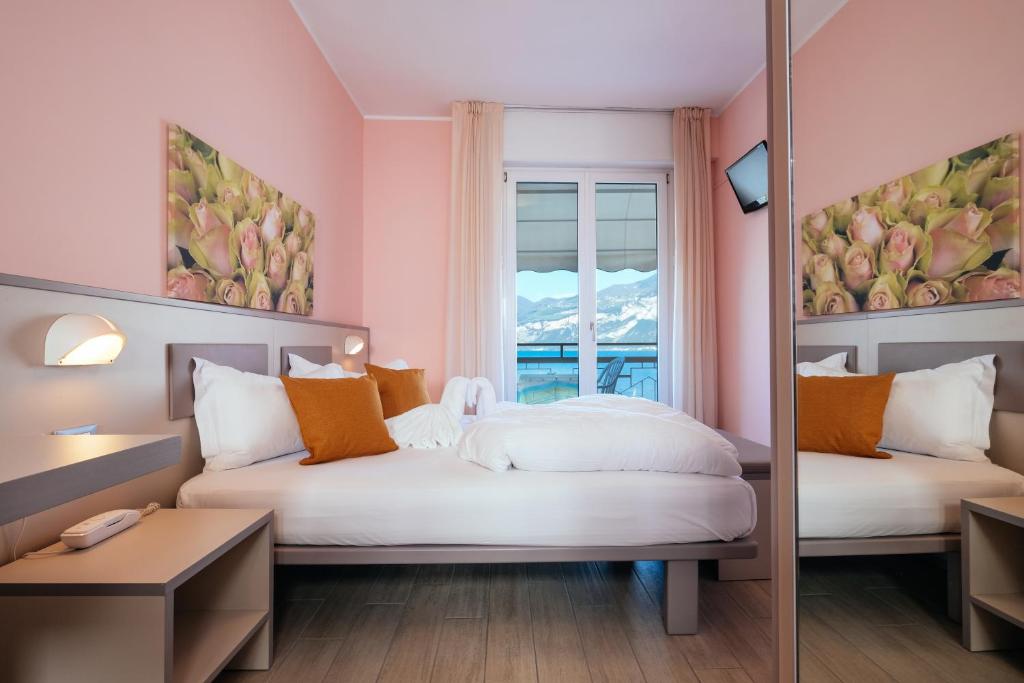 Postel nebo postele na pokoji v ubytování Hotel Firenze 3 Stelle Superior