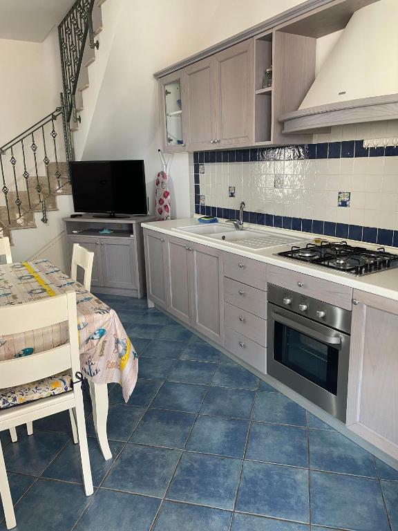 Kuchnia lub aneks kuchenny w obiekcie NEREA - Appartamento fronte mare