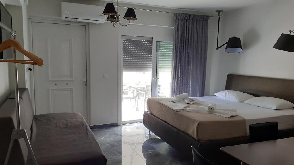 A bed or beds in a room at GIANNIS