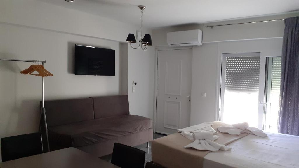 A bed or beds in a room at GIANNIS