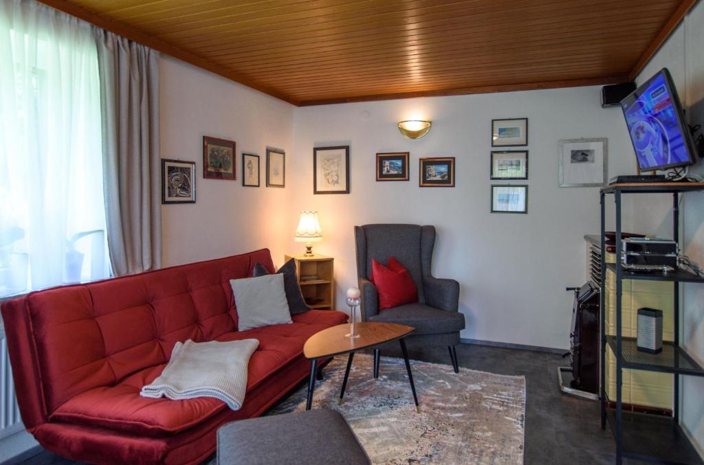TV a/nebo společenská místnost v ubytování Garten Appartement Harmony