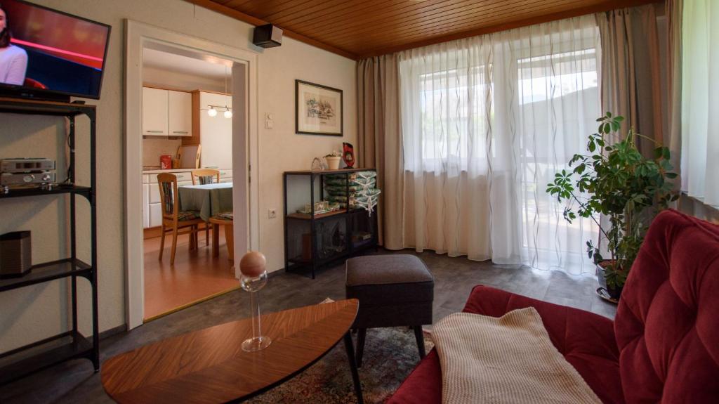 TV a/nebo společenská místnost v ubytování Garten Appartement Harmony