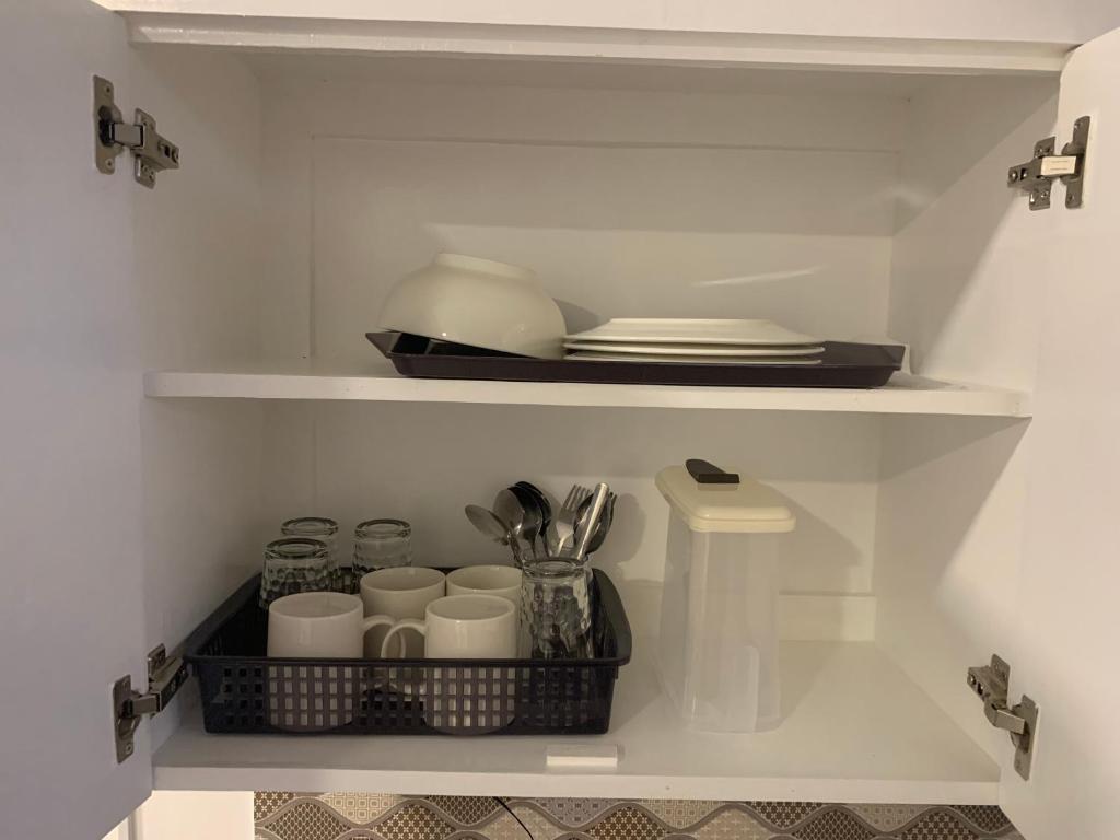 Kuchyň nebo kuchyňský kout v ubytování JORA Studio Apartment 1-B