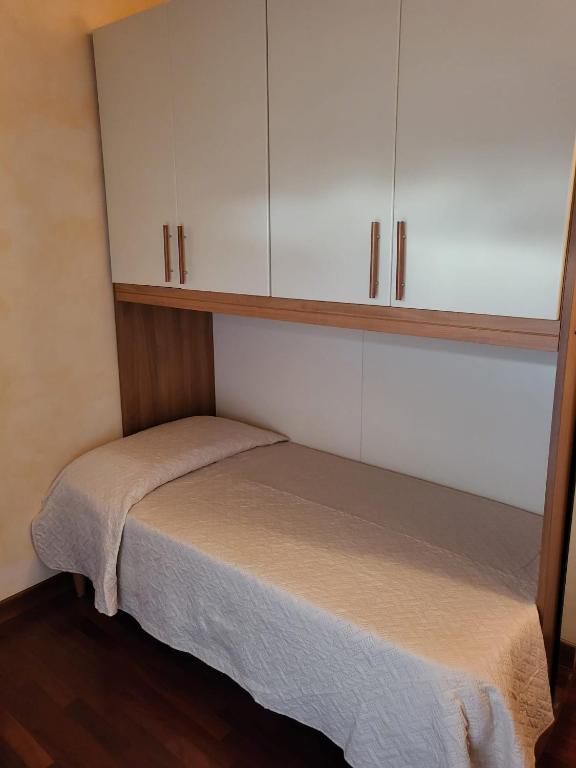 Posteľ alebo postele v izbe v ubytovaní The Shell Apartment