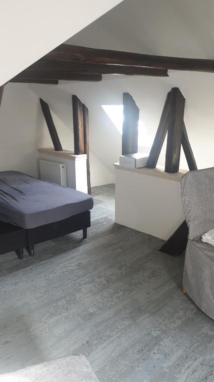 Postel nebo postele na pokoji v ubytování Kunstgasse 4+5