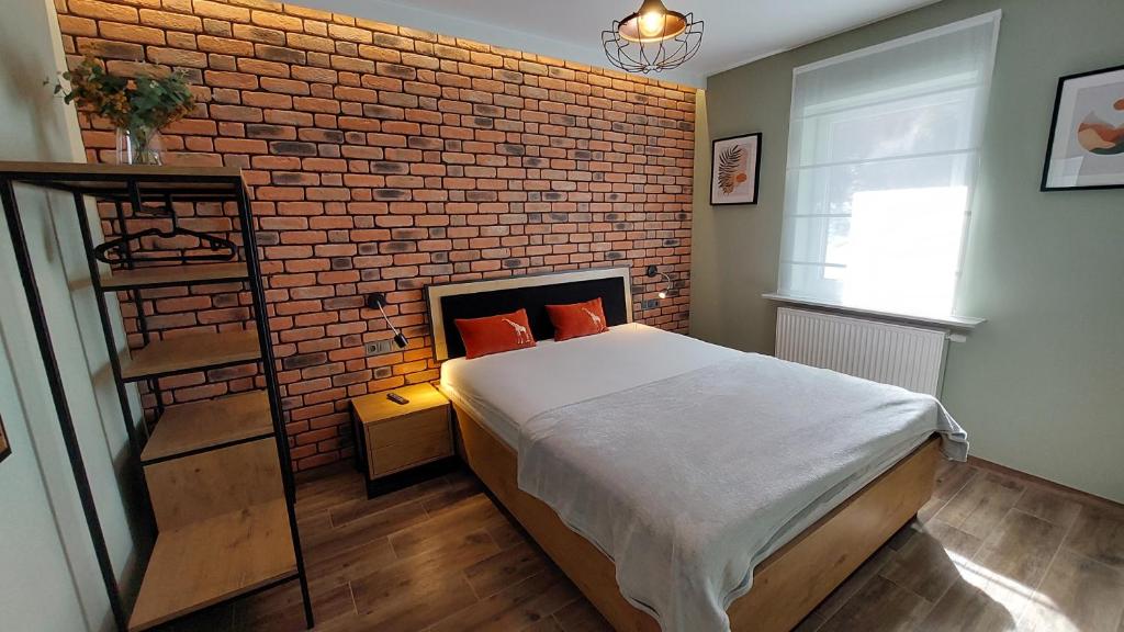 Postel nebo postele na pokoji v ubytování Apartament Wilczy Potok 400m od wyciągu Beskid Sport Arena - Dream Apart