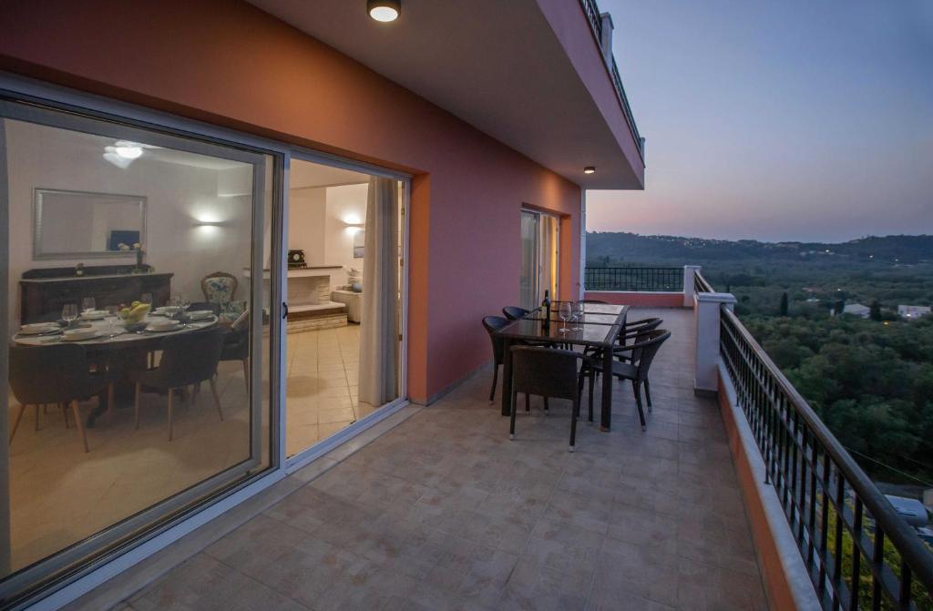A balcony or terrace at Spacious House with extraordinary view in Corfu