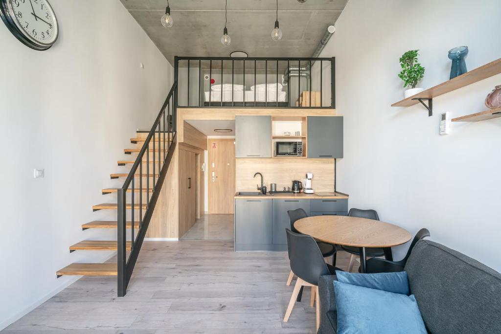 Kuchyňa alebo kuchynka v ubytovaní RentPlanet - Apartamenty Zarembowicza