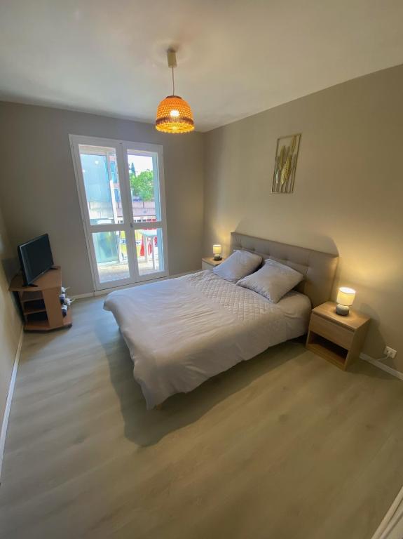 Posteľ alebo postele v izbe v ubytovaní Appartement T3 à la Seyne sur mer