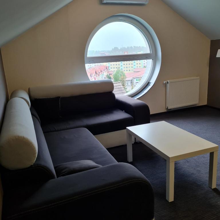 Posedenie v ubytovaní Apartament Wileńska