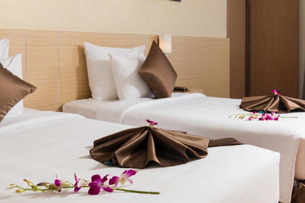 Giường trong phòng chung tại Sao Viet Nha Trang Hotel