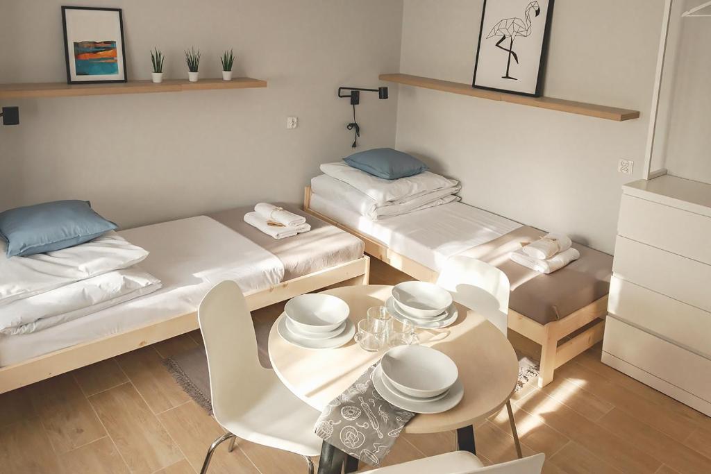 Postel nebo postele na pokoji v ubytování Apart Hostel S8