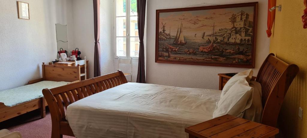 Postel nebo postele na pokoji v ubytování La Fontaine - Chambres d'Hôtes