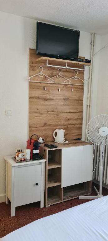 Postel nebo postele na pokoji v ubytování La Fontaine - Chambres d'Hôtes