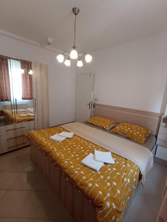 Postel nebo postele na pokoji v ubytování RoyalWings apartman Jagodina