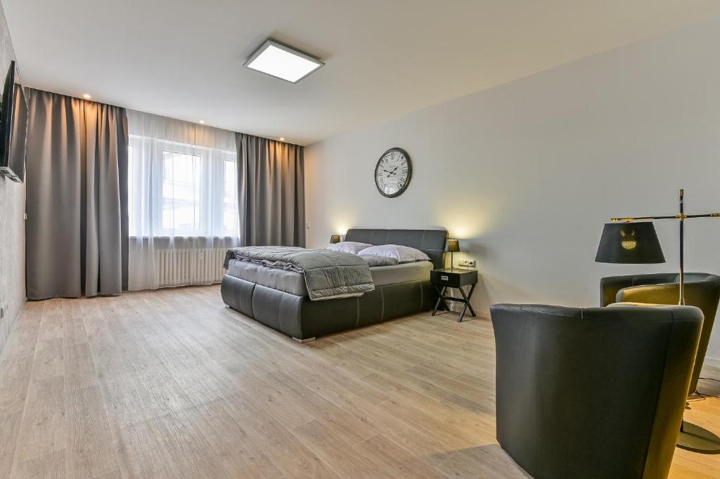 Postel nebo postele na pokoji v ubytování Hotel Stračena City