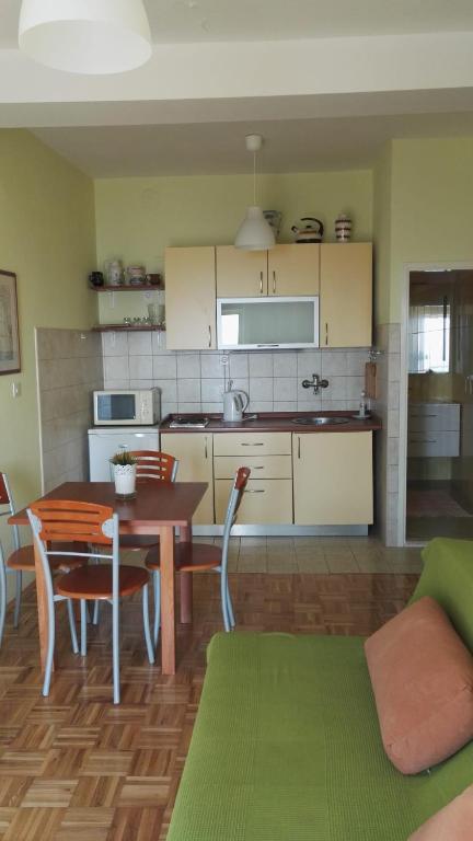 Kuchyňa alebo kuchynka v ubytovaní Apartment Dalma