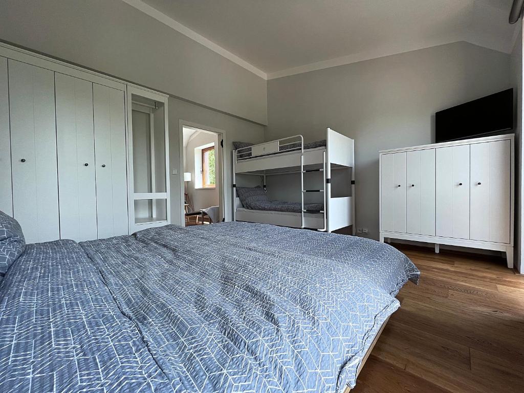 Postel nebo postele na pokoji v ubytování Apartmán HYGGE Bratrouchov