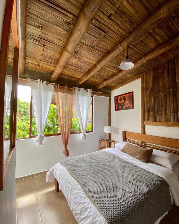 Postel nebo postele na pokoji v ubytování Cinnamon House