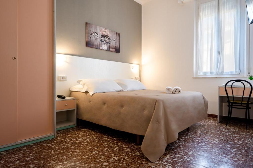 Postel nebo postele na pokoji v ubytování Amadei Hotel Blumen