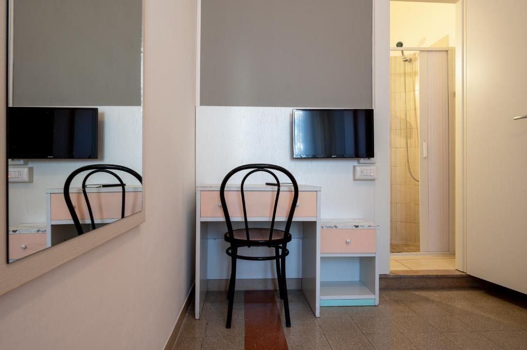 TV a/nebo společenská místnost v ubytování Amadei Hotel Blumen