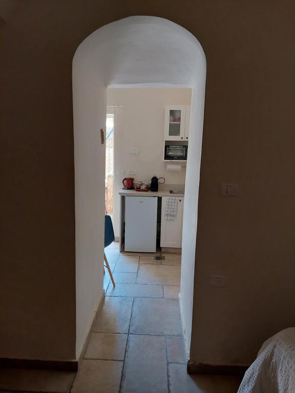 Postel nebo postele na pokoji v ubytování Legatia