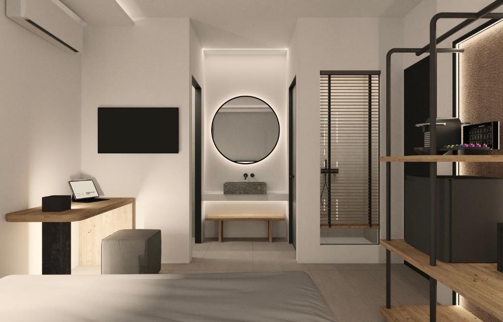 Postel nebo postele na pokoji v ubytování Neapolis 21 Suites, Premium Key Collection