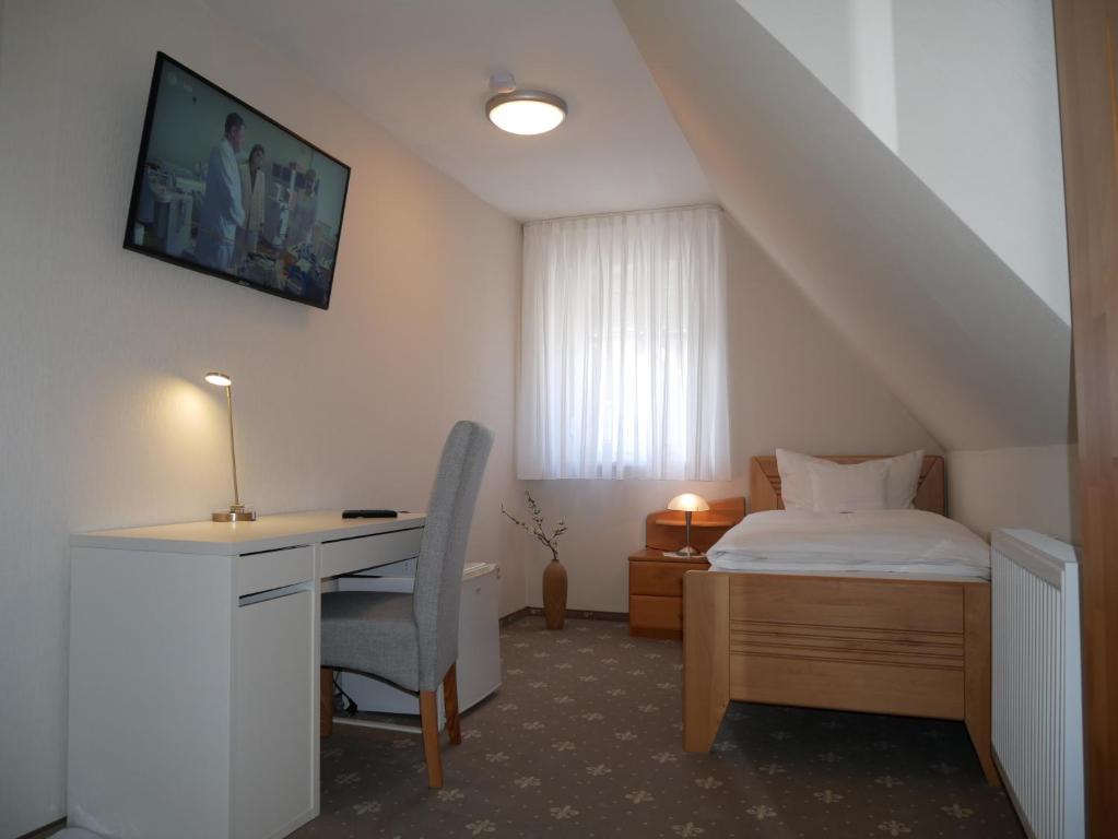 Postel nebo postele na pokoji v ubytování Hotel Thule