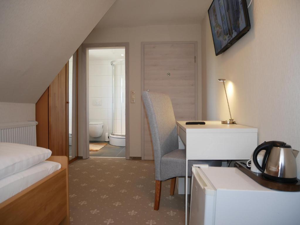 Postel nebo postele na pokoji v ubytování Hotel Thule