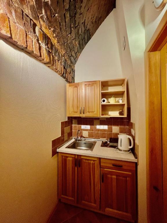 Kuchyň nebo kuchyňský kout v ubytování Express Guest House