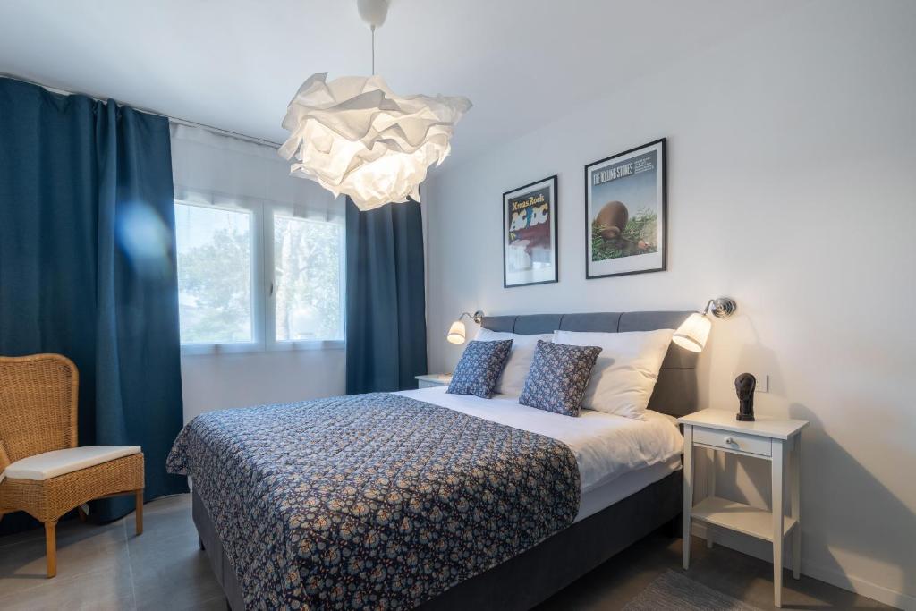 Postel nebo postele na pokoji v ubytování Villa Pinus