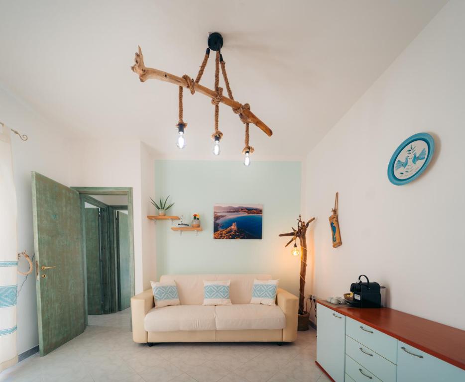 A bed or beds in a room at Dimora Pintau in residence con piscina privata