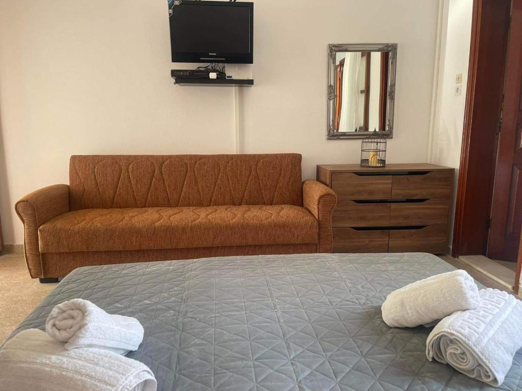 Posteľ alebo postele v izbe v ubytovaní Aegean Endless Summer Villa Pefkos