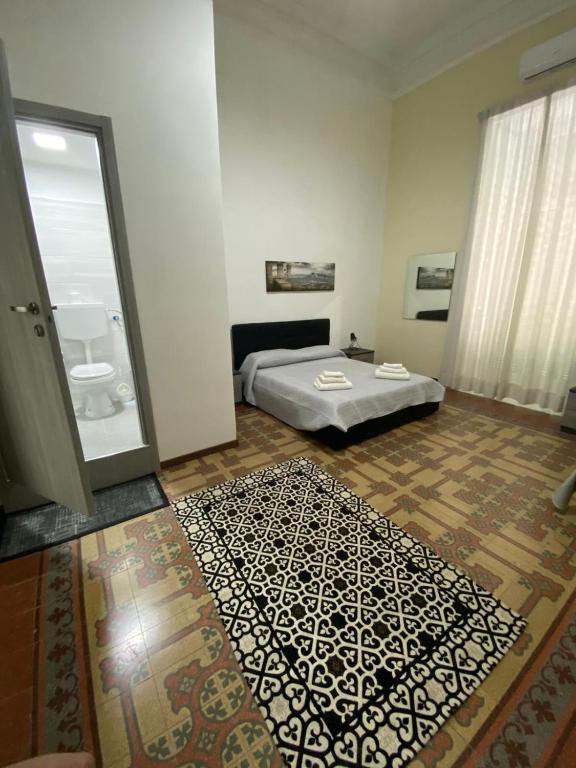 Posteľ alebo postele v izbe v ubytovaní Nel cuore Di Napoli