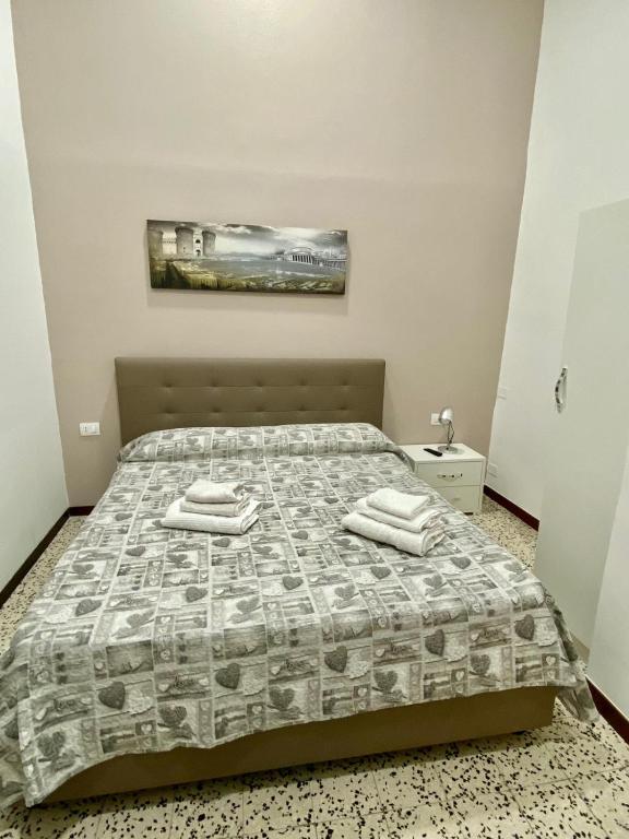 Posteľ alebo postele v izbe v ubytovaní Nel cuore Di Napoli