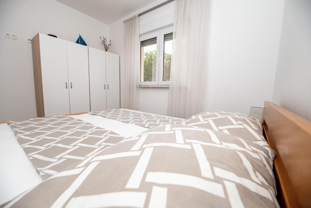 Posteľ alebo postele v izbe v ubytovaní Apartment Don Vito