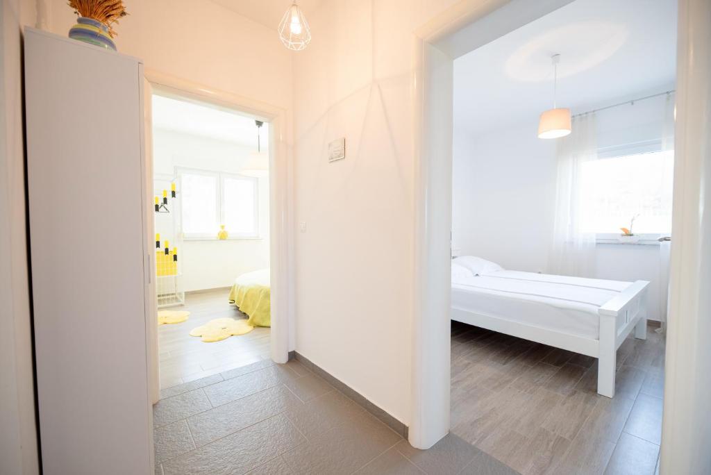 Posteľ alebo postele v izbe v ubytovaní Apartment Don Vito